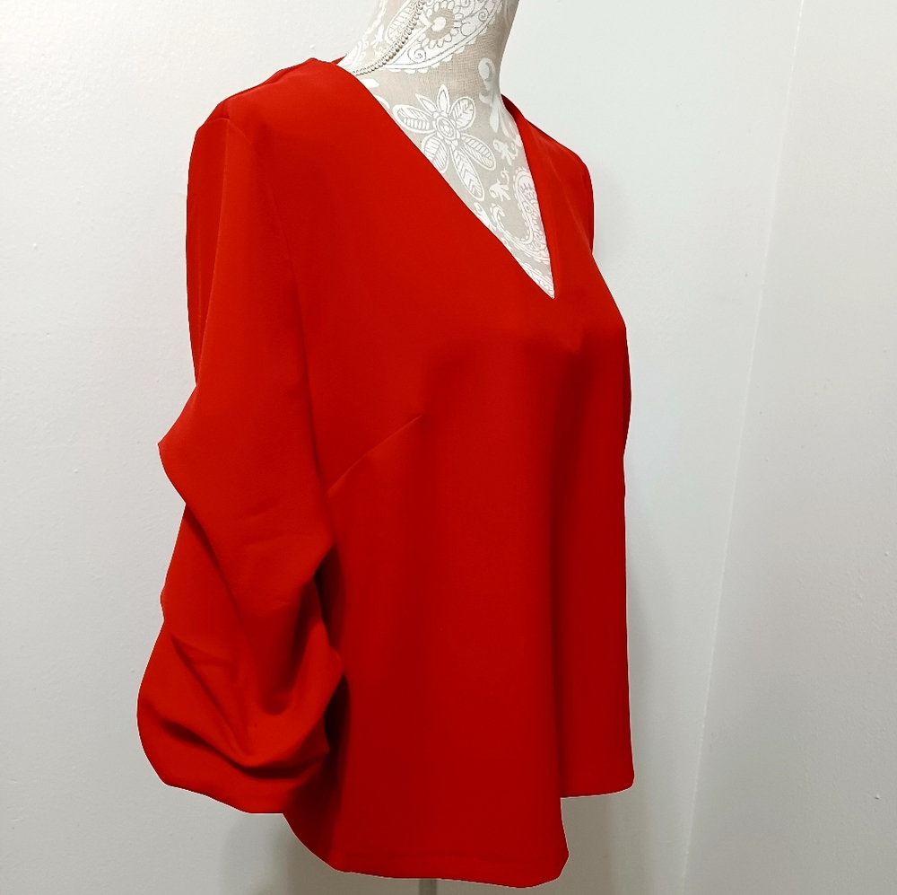 H&M red puffy blouse